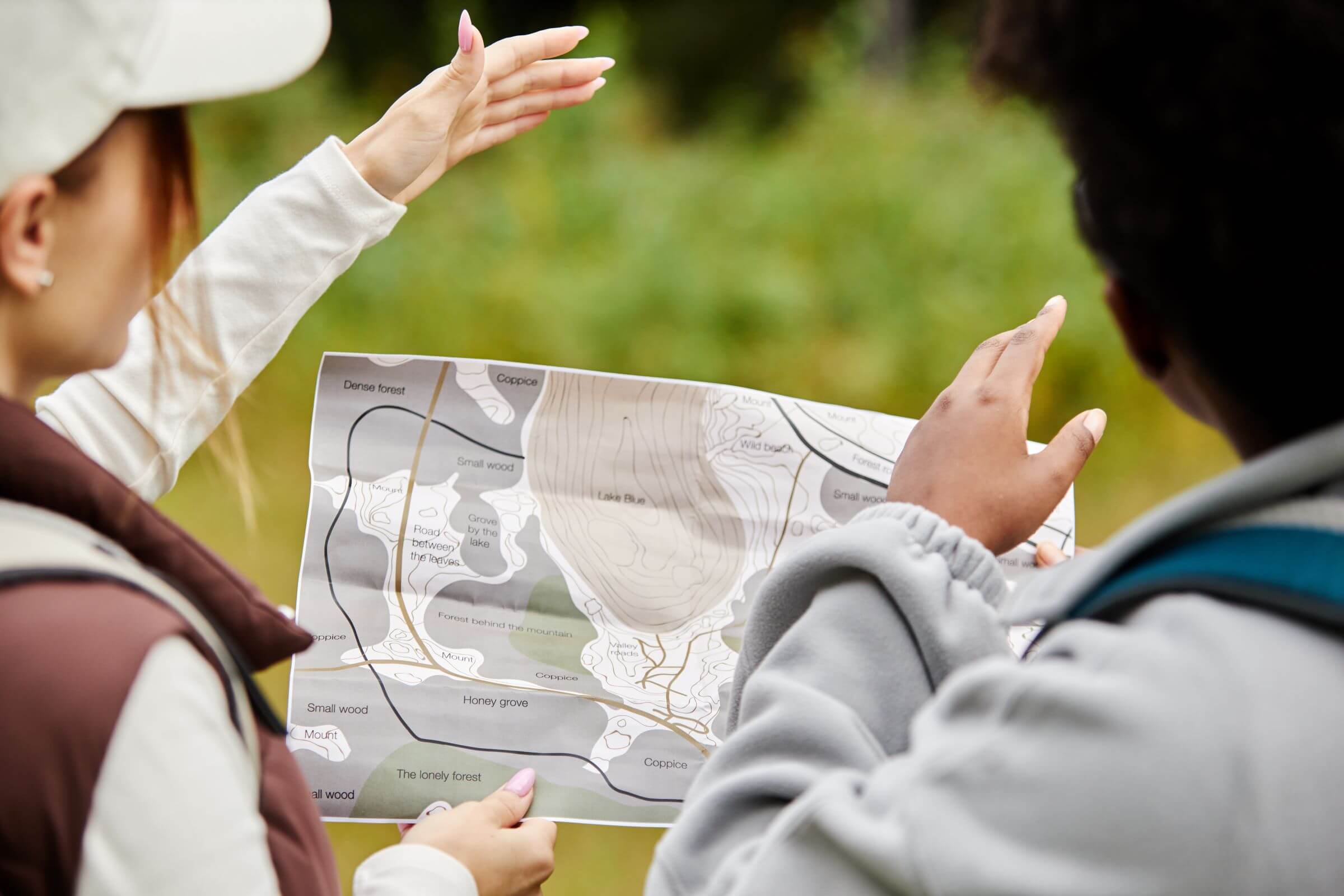 two women reading a map